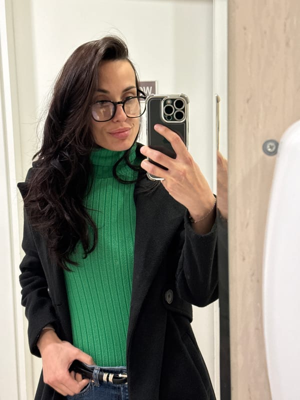 Woman takes selfie, winks at camera in Pleven bathroom