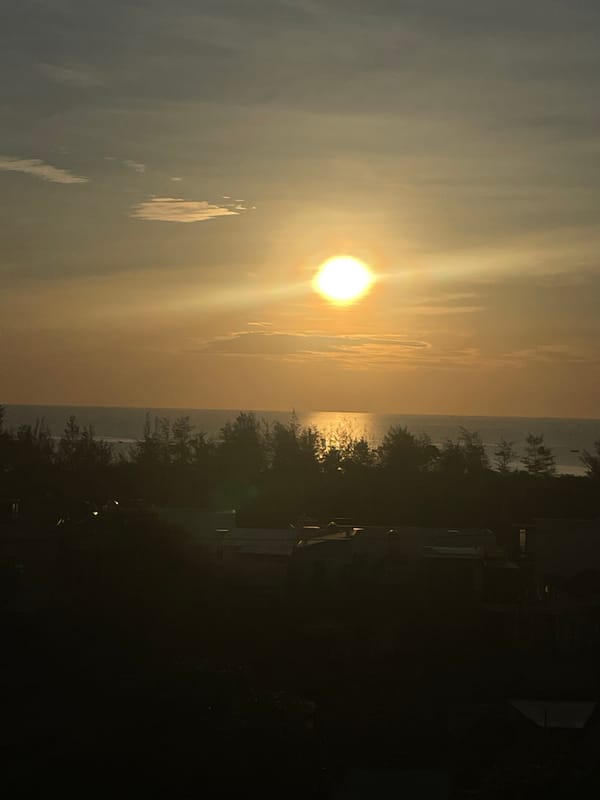 Golden hour sunset over the Hoi An coastline