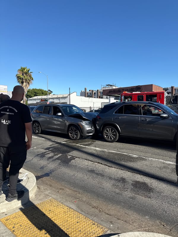 BMW and Mercedes collide on a Los Angeles city street