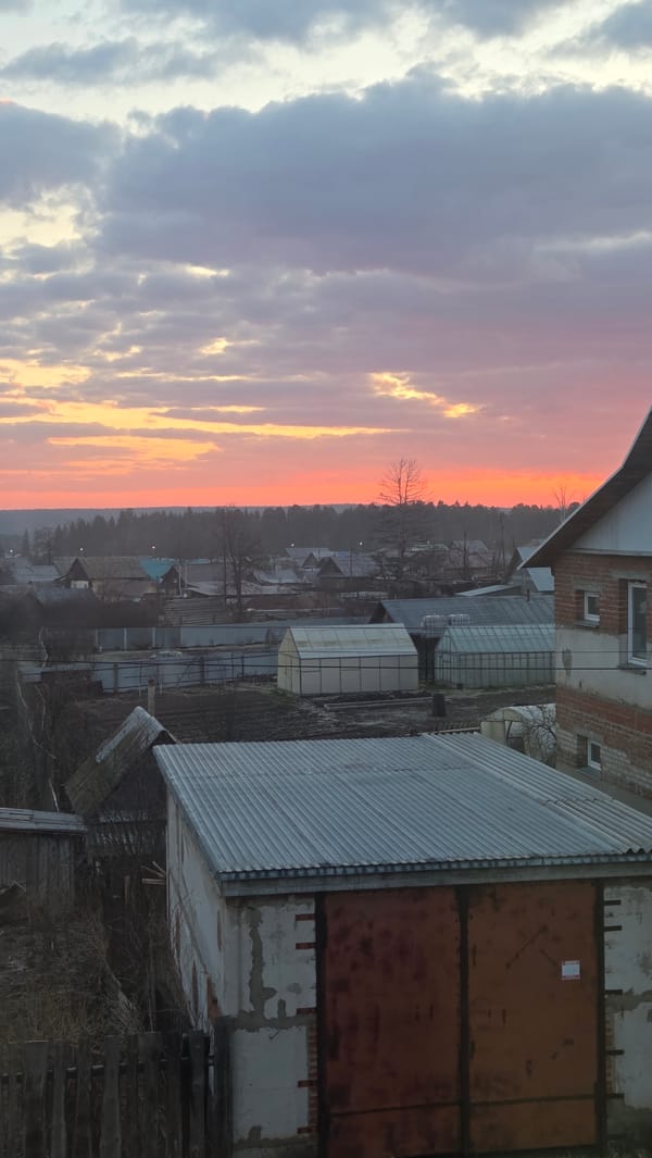 Colorful sunset observed over Chaikovsky residential area