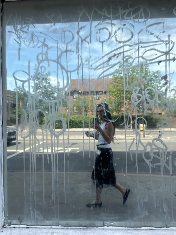 Window cleaning, dropped Spiderman cap spotted in London street
