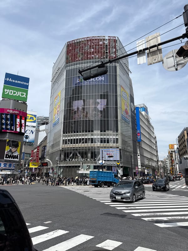 Busy morning rush captured at Tokyo's Shibuya Crossing