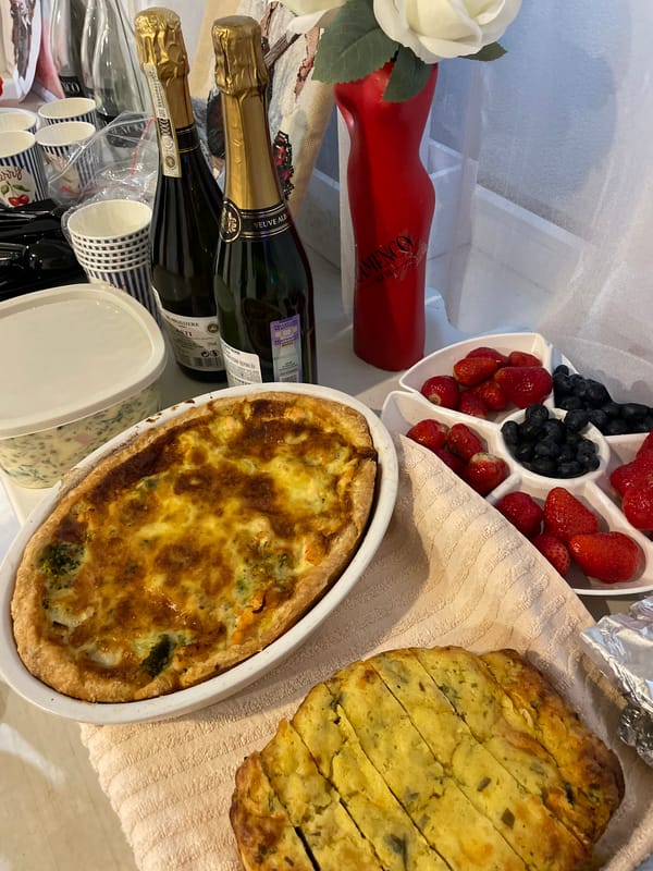 Celebration with food, champagne, flowers documented in Sochi