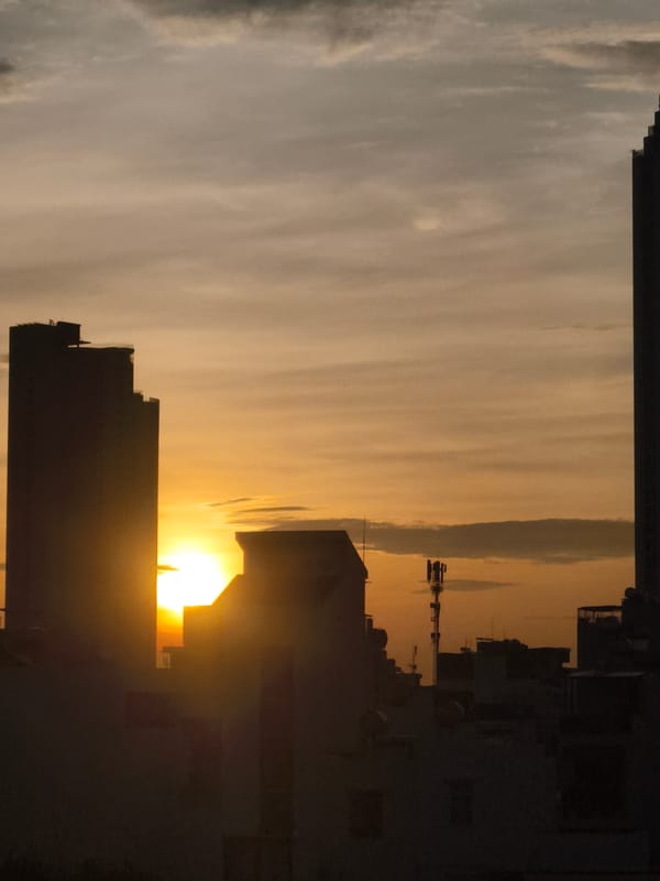 City skyline caught between sunrise and sunset light