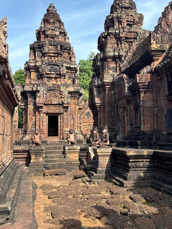 Exploring Banteay Srei's red sandstone carvings and surrounding countryside