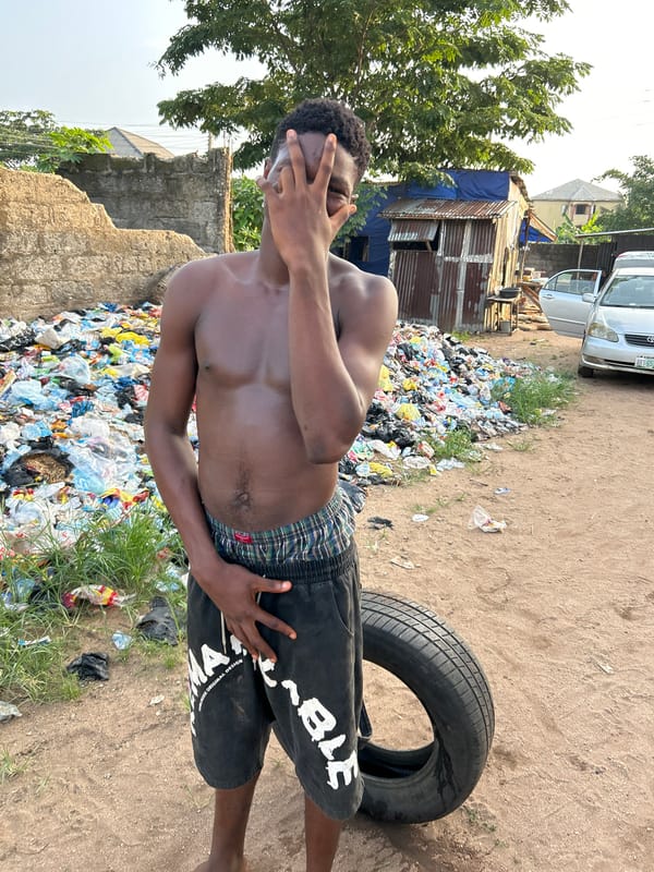 Young men photographed in outdoor settings in Ihiagwa, Nigeria