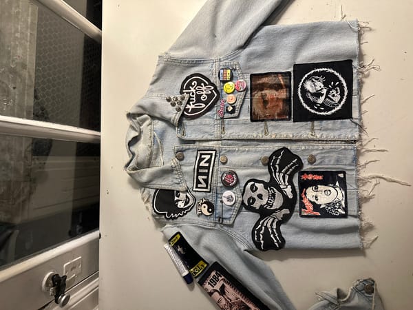 Patch-covered denim jacket documented in Buenos Aires