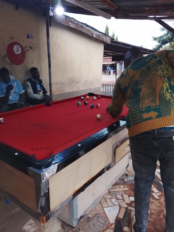 Evening street life and sports facilities across Jos and Kabong