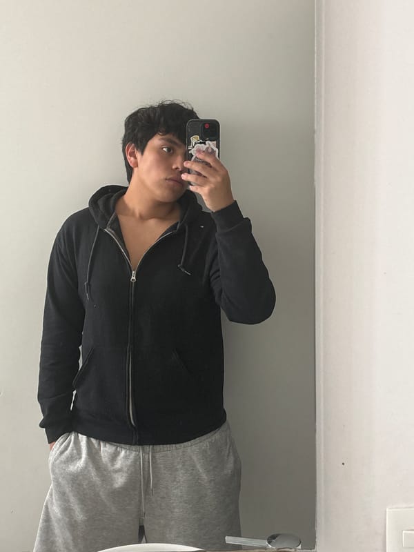 Young person takes bathroom selfie in Mexico City
