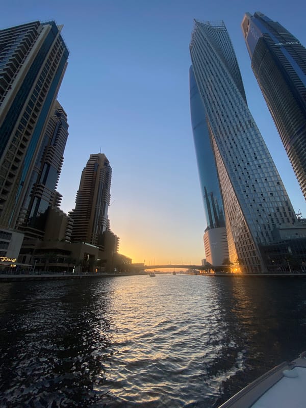 Dubai skyline with skyscrapers and water captured by witness