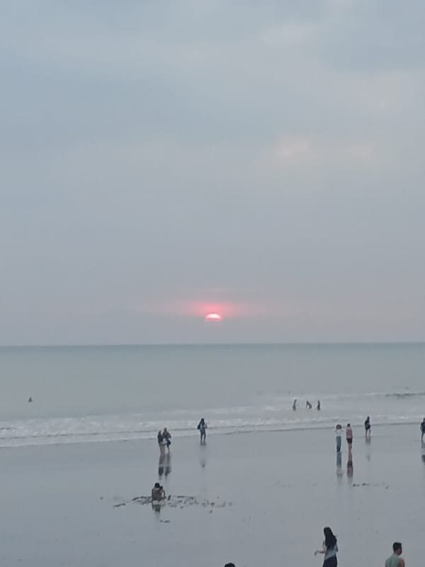 Kuta Beach at sunset, multiple perspectives