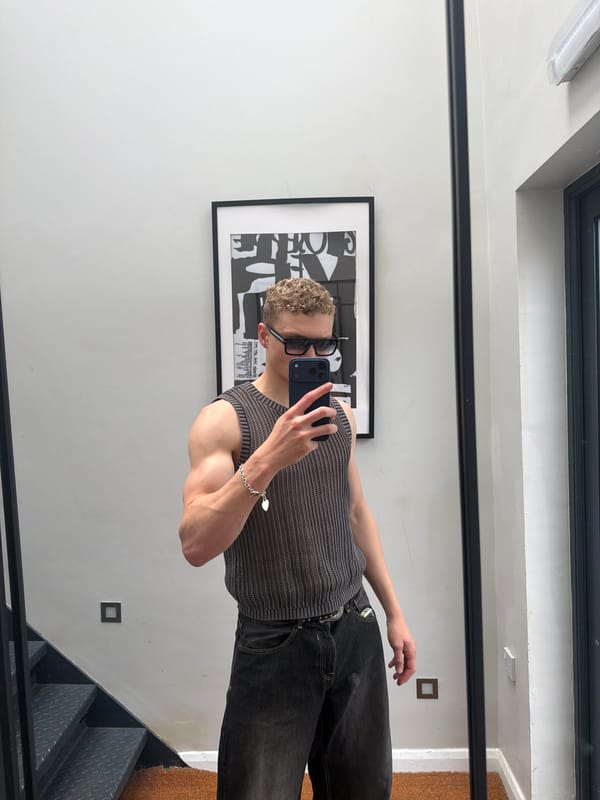 Person takes mirror selfie in London