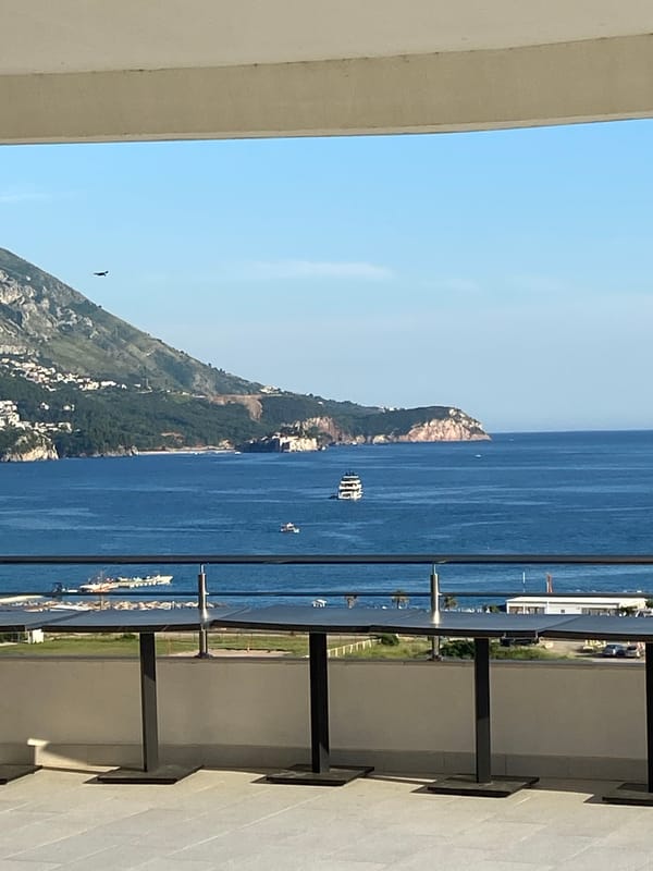 Tourist documents luxury stay at modern Boreti resort overlooking Kotor