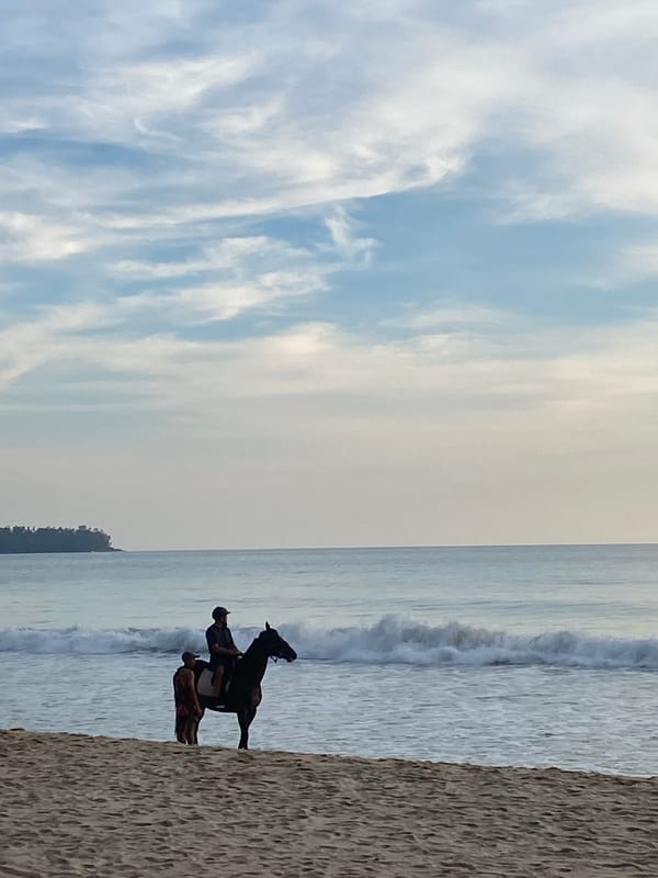 Sunset horseback riding and beach dining captured in Thailand