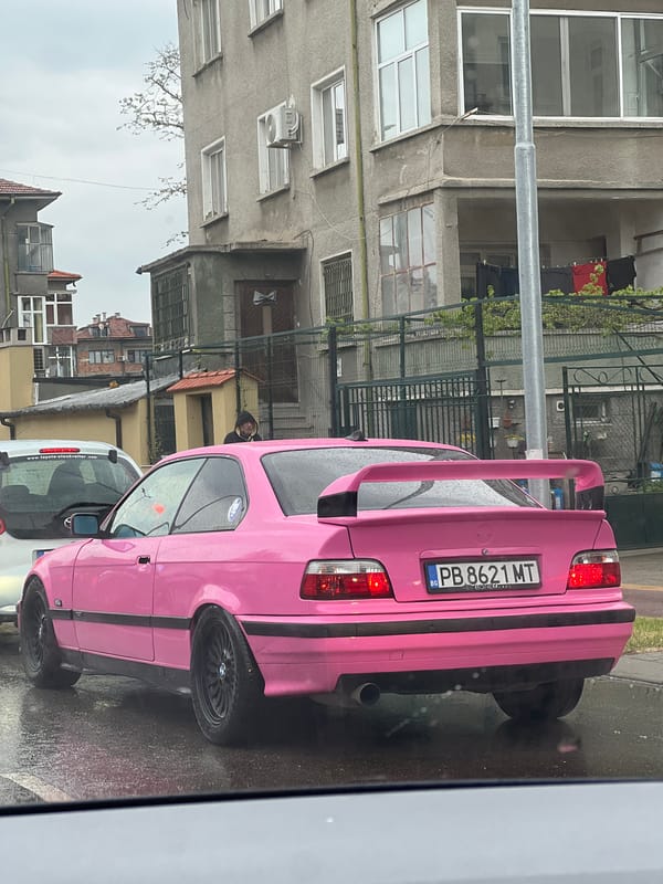 Pink BMW coupe spotted on wet Plovdiv street