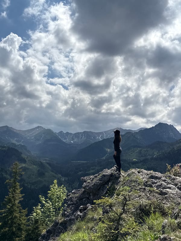 Hikers gather on Tatra Mountain cliffs near Zakopane