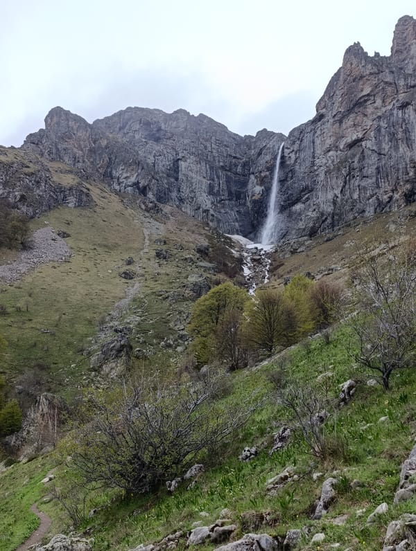 Waterfall spotted cascading down rocky cliffs near Kalofer, Bulgaria