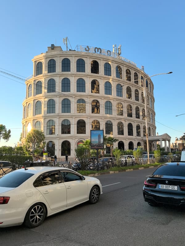 Striking modern architecture with arched windows and angular design