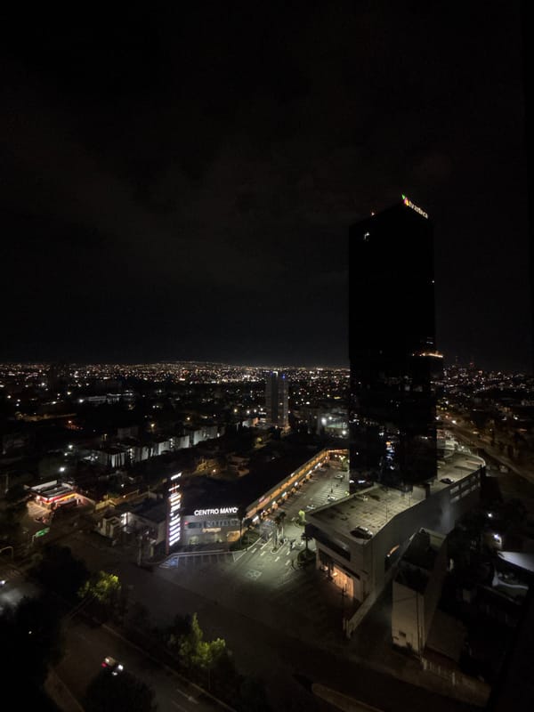 Nighttime aerial views capture Puebla cityscape and modern interior