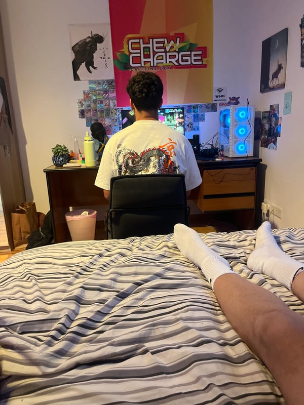 Afternoon gaming session in a Limassol bedroom, July 2026.