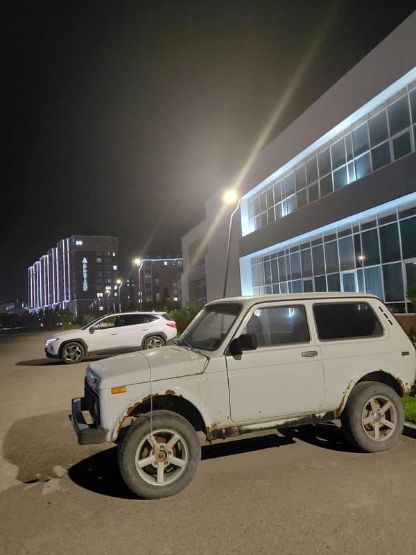Aktau at night: lit pathways and modern architecture