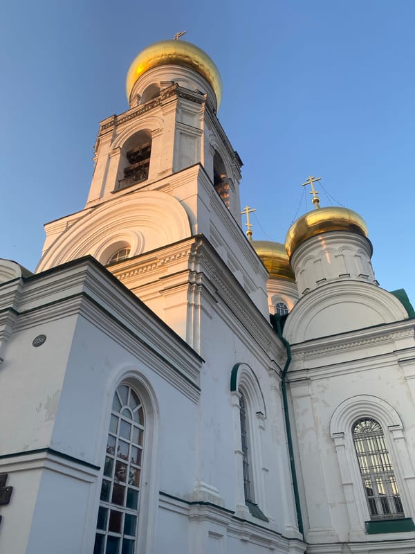Nizhny Novgorod churches, skyline, and street scenes at golden hour