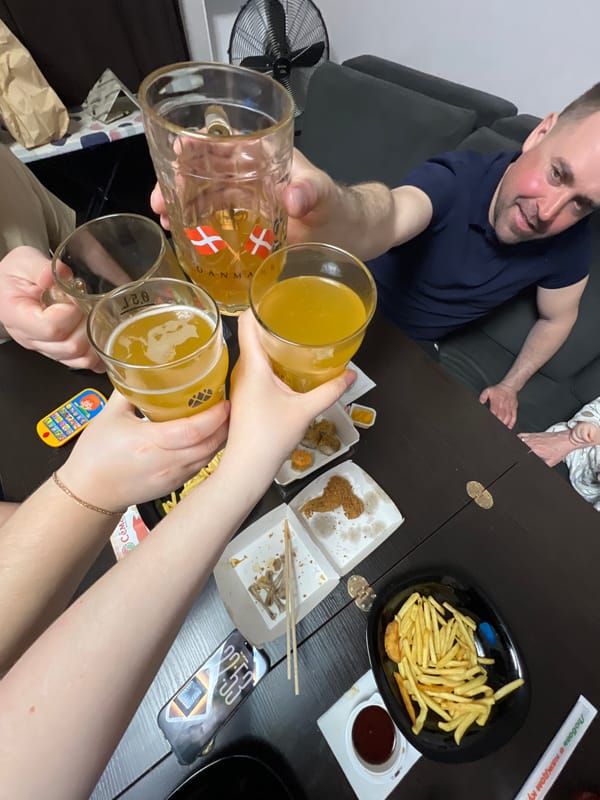 Friends gather for casual dinner party in Perm apartment