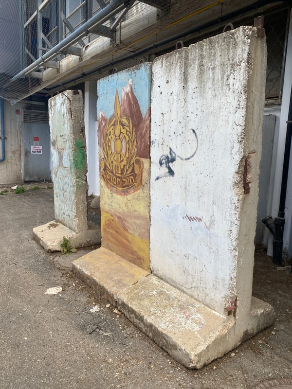 Concrete memorial or art installation observed in Haifa