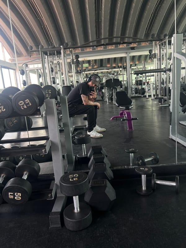 Person in athletic wear sits in Mexico City gym
