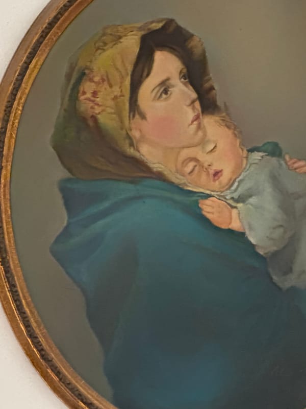 Framed painting of woman with baby documented in Puebla