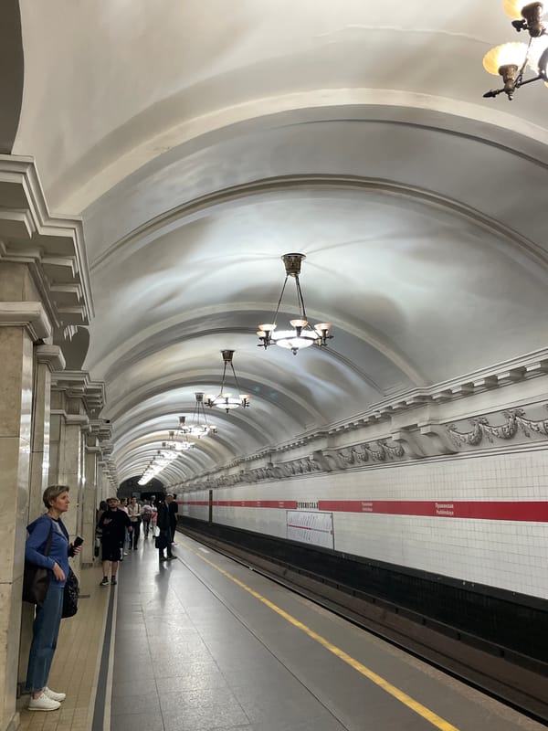 Pushkinskaya metro station's architecture and ornate brass detail