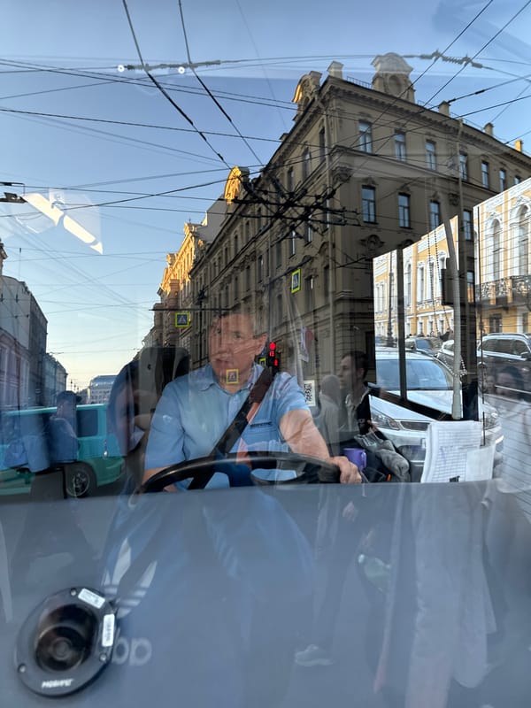 Saint Petersburg residents, tourists navigate historic city center evening