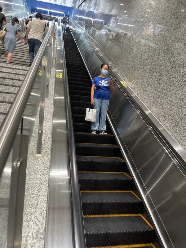 Morning commute through Shiguang Lu subway station, Panyu District