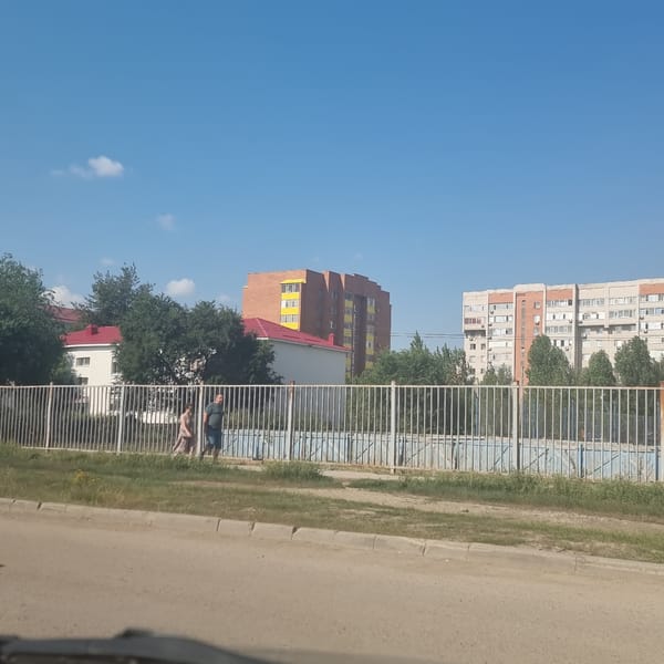 Everyday street life in Aktobe, Kazakhstan, one summer morning