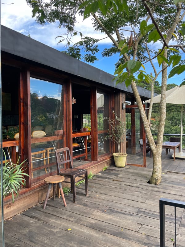 Morning at hillside cafe in Da Lat with valley views