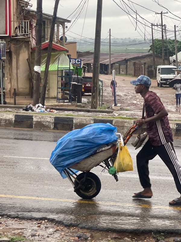 Wet city streets, daily errands, and street-level urban life
