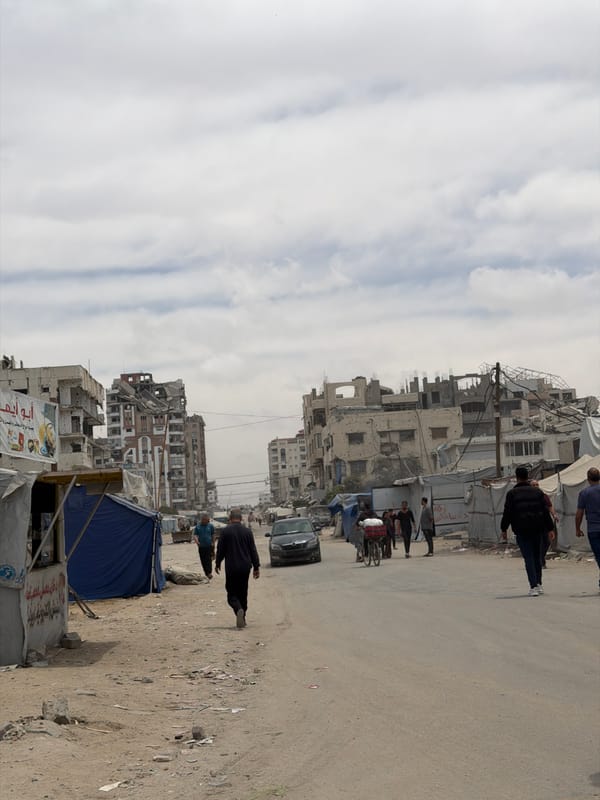 Gaza street activity observed amid damaged buildings, makeshift shelters