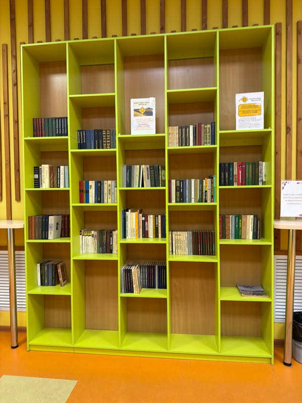 Interior spaces documented in Murmansk including charity donation box