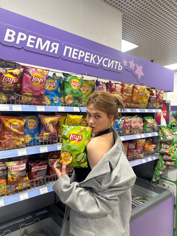 Woman shops, relaxes with beer in Krasnoyarsk evening