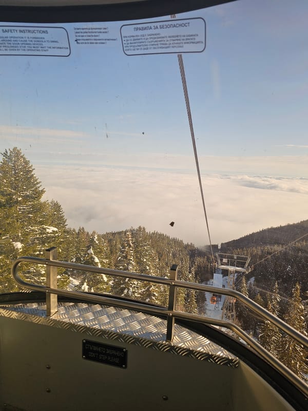Gondola rider captures winter landscape view in Samokov, Bulgaria