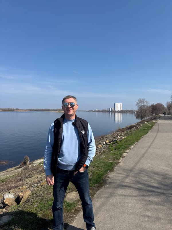 Man stands by river path in Engels, Russia