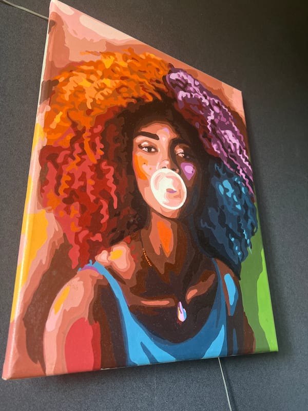 Colorful artwork and stickers on surfaces in Bucha