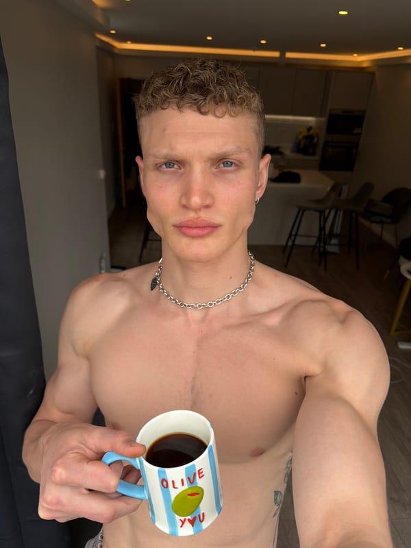 London resident photographed with novelty coffee mug, takes selfie