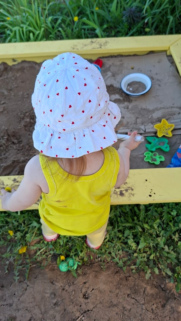 Spring morning activities captured in Russian village playground area