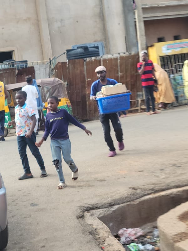 Daily life scenes documented across Jos, Nigeria neighborhoods