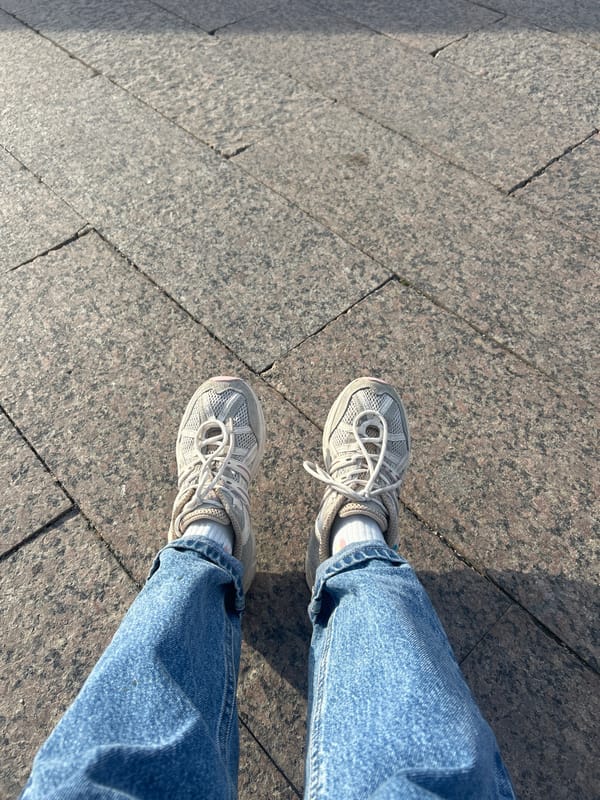Person documents sunny afternoon moments across central Moscow cityscape