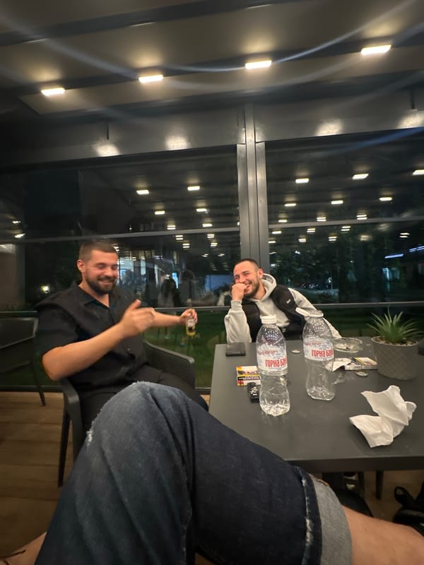 Two men dine at outdoor restaurant in Plovdiv