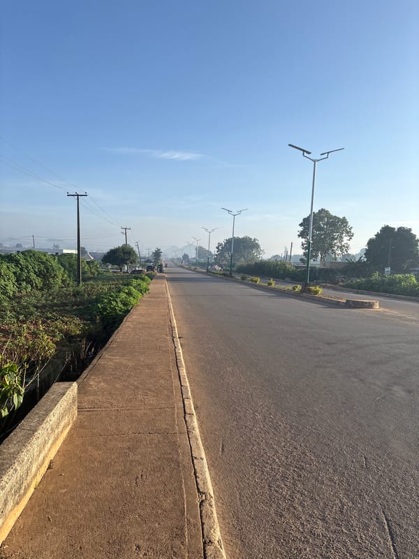 Morning street scenes along a quiet road in Bukuru, Nigeria