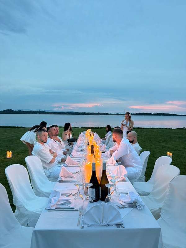 Outdoor dinner party held at dusk in Sithonia, Greece