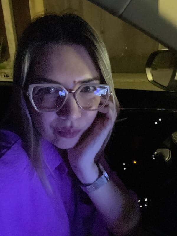 Nighttime car selfie with purple ambient lighting, Sochi